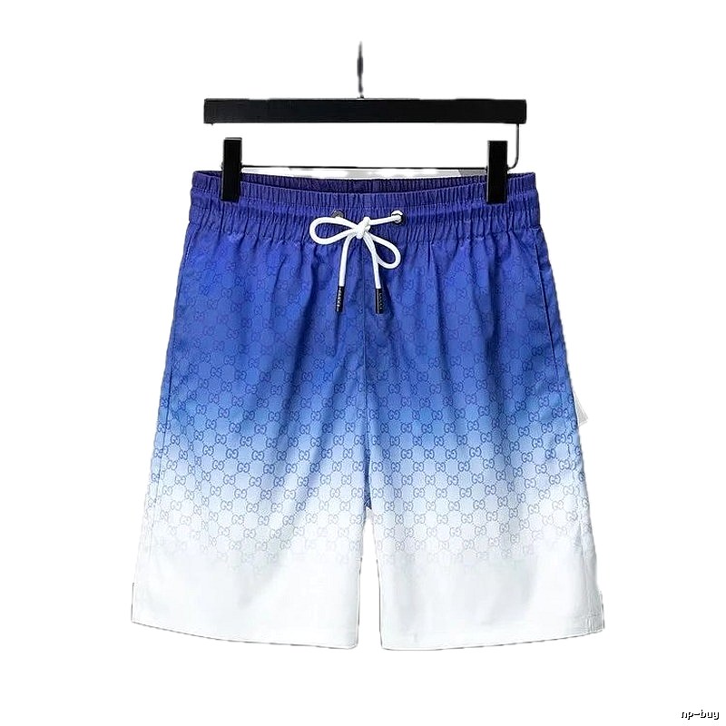 Gucci gradient-style blue and white shorts