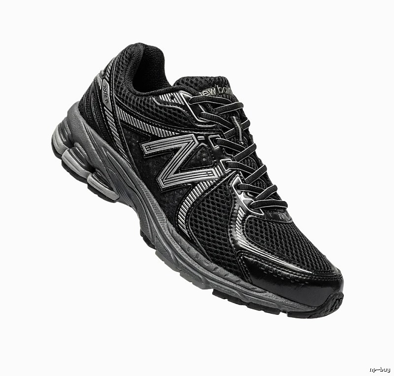New Balance retro-style black and grey sports shoes